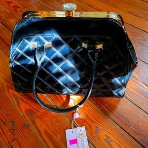 Black patent leather quilted handbag
